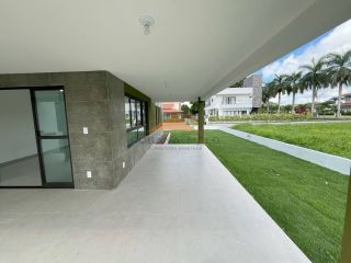 Casa no Condomínio Terra Viva, 315m², 4 suítes, varanda ampla em L, espaço gourmet, área verde, garagem para 2 carros