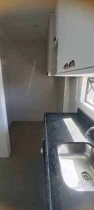 Edifício Porto Horizonte, 51m², 2 quartos, 1 suíte, banheiro social, cozinha/área de serviço, 1 vaga de garagem