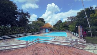 Ampla casa em condomínio fechado com 4 amplas suítes | 577m² | ao lado da BR 408 em Paudalho