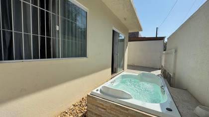 Casa na praia com jacuzzi sendo vendida abaixo do valor de mercado
