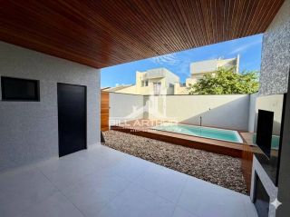 Sobrado com piscina a apenas 800 metros da praia em Itajuba
