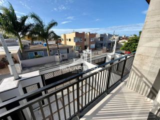 Sobrado com piscina a apenas 800 metros da praia em Itajuba
