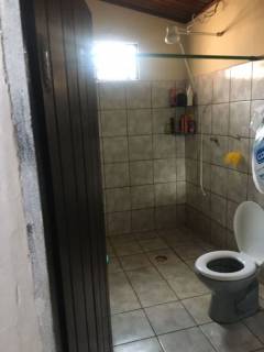 Casa com excelente localização ,proximo a Av. Filinto  Muller