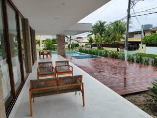 Casa de Condomínio Para Vender com 6/4 sendo 6 suítes em Guarajuba, Camaçari