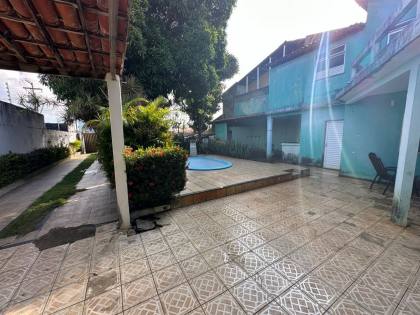 Casa com Piscina na Aruana