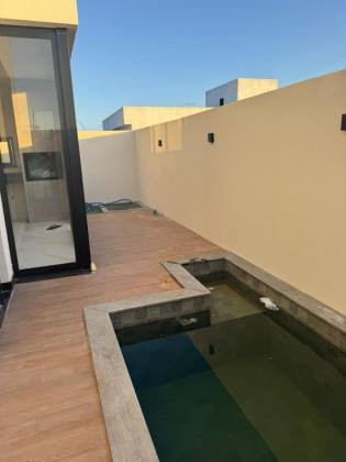 Casa com Piscina no Padang Beach Residence