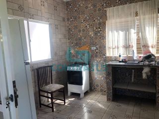 Terreno com 3 casas no Cond. Porto Belo