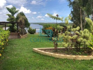 Terreno com 3 casas no Cond. Porto Belo