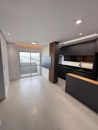 Lindo apartamento mobiliado de 02 quartos com suíte e garagem.