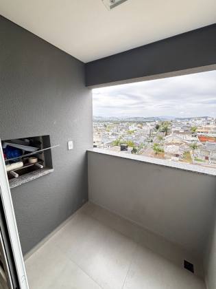 Lindo apartamento mobiliado de 02 quartos com suíte e garagem.