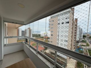 Lindo apartamento de 2 quartos com sacada gourmet e vista para o mar no Estreito
