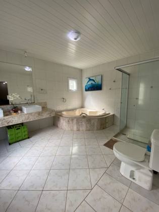 Casa à Venda no Villas do Bosque – 412 m², 3 Suítes, 2 vagas, Area Verde e Espaço Gourmet