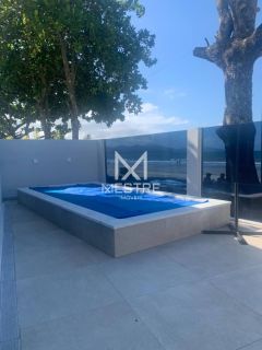 CASA FRENTE MAR EM BALN. PEREQUÊ COM PISCINA AQUECIDA