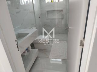 CASA COM PISCINA EM BALNEÁRIO DE PEREQUÊ SC