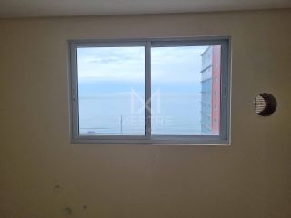APARTAMENTO VISTA MAR COM 04 SUÍTES NO ED. OCEAN TOWER LOCALIZADO NA MEIA PRAIA