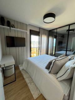 Vista definitiva para lagoa e mar