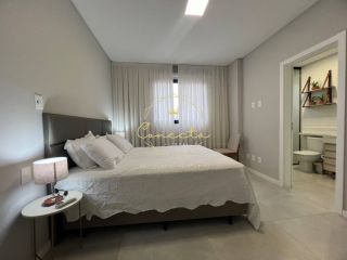 Apartamento a venda em itapema/meia praia, 2 suítes, 2 vagas de garagem, mobiliado.