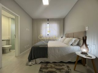 Apartamento a venda em itapema/meia praia, 2 suítes, 2 vagas de garagem, mobiliado.