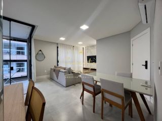 Apartamento a venda em itapema/meia praia, 2 suítes, 2 vagas de garagem, mobiliado.