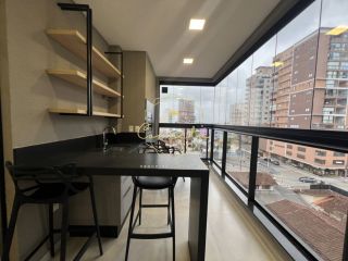 Apartamento a venda em itapema/meia praia, 2 suítes, 2 vagas de garagem, mobiliado.