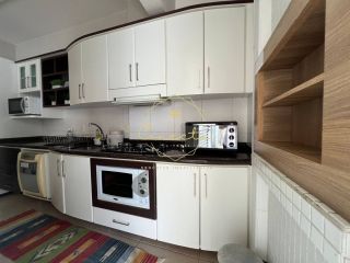 OPORTUNIDADE ÚNICA COM VISTA MAR! Apartamento com 4 dormitórios mobiliado, sendo 1 suíte, 2 vagas de garagem!