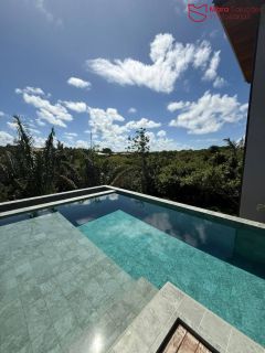 Casa Alto Padrão à Venda no Condomínio Praia Bella, Localização privilegiada: lote com frente, fundo e lateral direita para alameda.