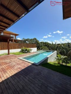 Casa Alto Padrão à Venda no Condomínio Praia Bella, Localização privilegiada: lote com frente, fundo e lateral direita para alameda.