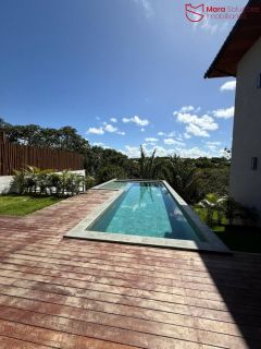 Casa Alto Padrão à Venda no Condomínio Praia Bella, Localização privilegiada: lote com frente, fundo e lateral direita para alameda.