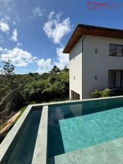 Casa Alto Padrão à Venda no Condomínio Praia Bella, Localização privilegiada: lote com frente, fundo e lateral direita para alameda.
