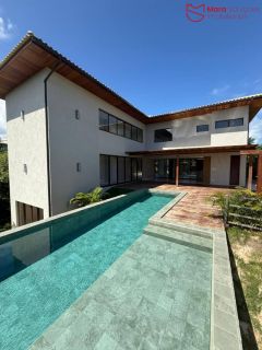 Casa Alto Padrão à Venda no Condomínio Praia Bella, Localização privilegiada: lote com frente, fundo e lateral direita para alameda.