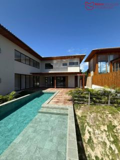 Casa Alto Padrão à Venda no Condomínio Praia Bella, Localização privilegiada: lote com frente, fundo e lateral direita para alameda.