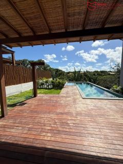 Casa Alto Padrão à Venda no Condomínio Praia Bella, Localização privilegiada: lote com frente, fundo e lateral direita para alameda.
