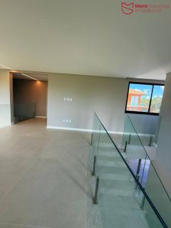 Casa Alto Padrão à Venda no Condomínio Praia Bella, Localização privilegiada: lote com frente, fundo e lateral direita para alameda.