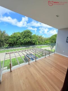 Casa Alto Padrão à Venda no Condomínio Praia Bella, Localização privilegiada: lote com frente, fundo e lateral direita para alameda.
