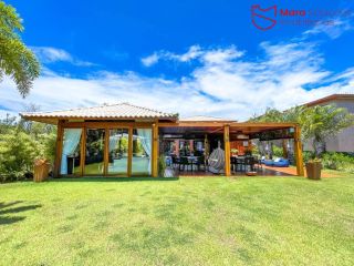 Casa de á Venda com 4/4, sendo 4 suítes no Condomínio Ilha dos Pássaros.