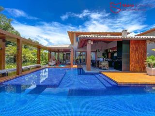 Casa de á Venda com 4/4, sendo 4 suítes no Condomínio Ilha dos Pássaros.