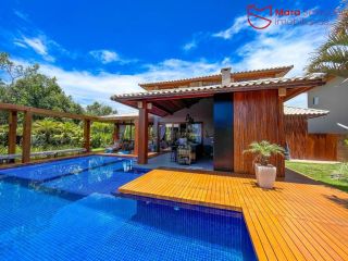 Casa de á Venda com 4/4, sendo 4 suítes no Condomínio Ilha dos Pássaros.