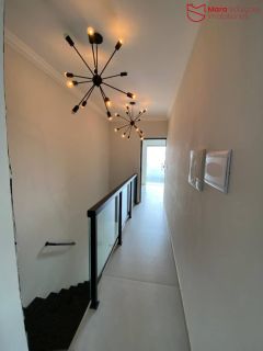 Viva com Estilo: Casa 2/4 com Suítes, Closet e Terraço Exclusivo.