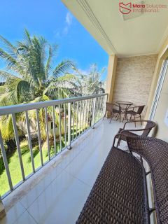 Apartamento mobiliado 2/4 com suíte, varanda ampla e excelente localização em Lauro de Freitas.