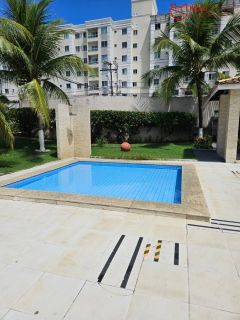 Apartamento mobiliado 2/4 com suíte, varanda ampla e excelente localização em Lauro de Freitas.