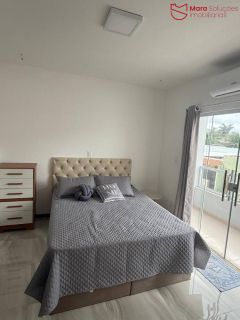 Casa Alto Padrão no Condomínio Parque do Jacuípe com 4 Suítes, Piscina e 270m² em Terreno de 500m².