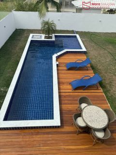 Casa Alto Padrão no Condomínio Parque do Jacuípe com 4 Suítes, Piscina e 270m² em Terreno de 500m².