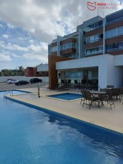 Apartamento a poucos metros da praia com vista mar no Praia do Flamengo – 2/4 com suíte, 68m², todo climatizado, 2 vagas e porteira fechada – pronto para morar!