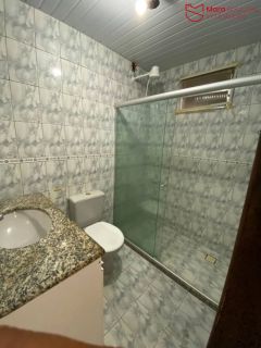 Casa de Rua 3/4 com Suíte, Garagem e Área Ampla