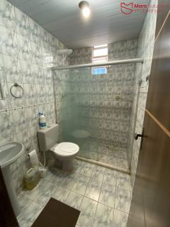Casa de Rua 3/4 com Suíte, Garagem e Área Ampla