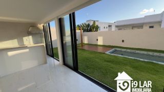 Casa Exclusiva com 4 Suítes e Área Gourmet à Venda no Alphaville Litoral Norte 2