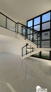 Casa Exclusiva com 4 Suítes e Área Gourmet à Venda no Alphaville Litoral Norte 2