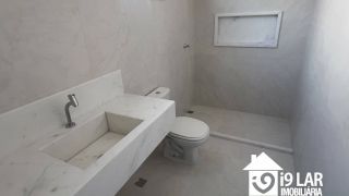 Casa Exclusiva com 4 Suítes e Área Gourmet à Venda no Alphaville Litoral Norte 2