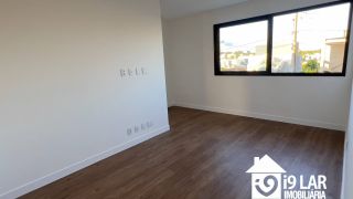 Casa Exclusiva com 4 Suítes e Área Gourmet à Venda no Alphaville Litoral Norte 2