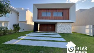 Casa Exclusiva com 4 Suítes e Área Gourmet à Venda no Alphaville Litoral Norte 2